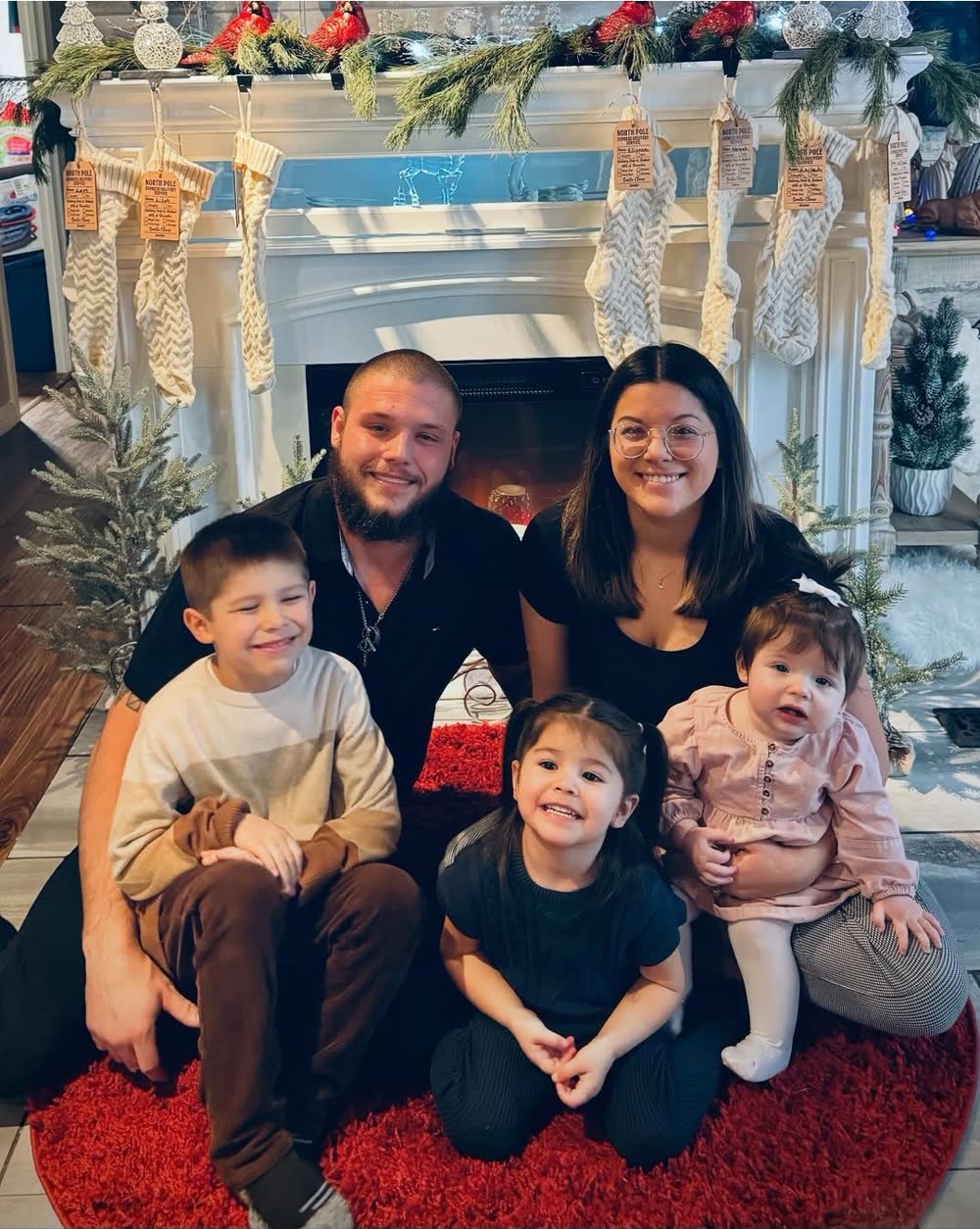 Andrew Bailey, co-owner of Toledo Sealcoating, with his family